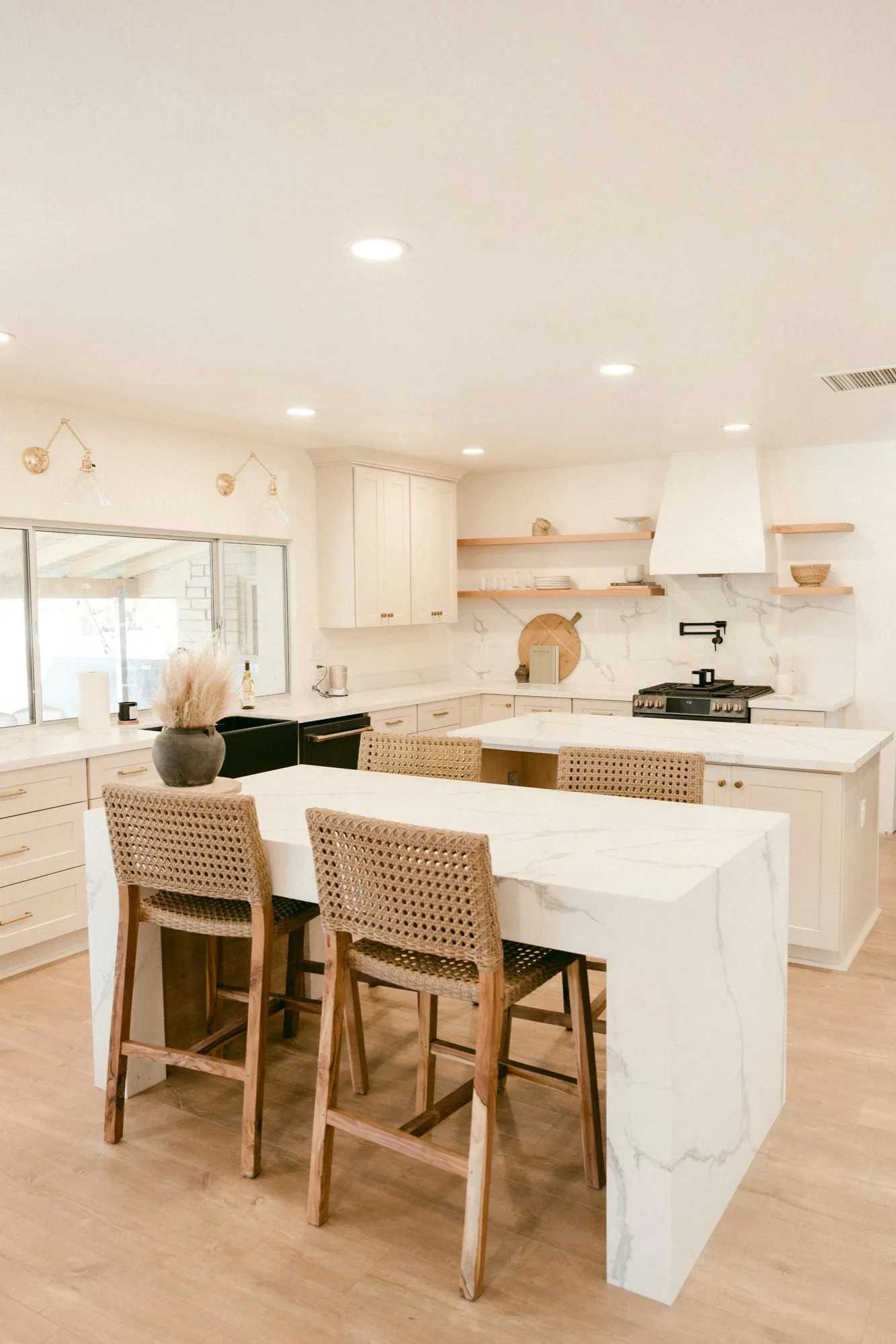 A clean, modern kitchen with a breakfast island